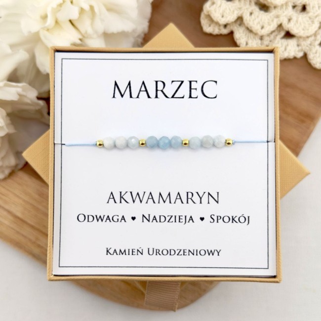jasnoniebieska bransoletka urodzinowa marzec z kamienia akwamarynu na sznurku