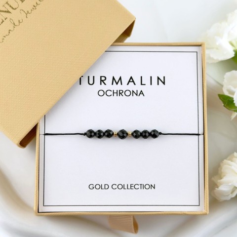 bransoletka z czarnego turmalinu krótka na sznurku złote kulki 585