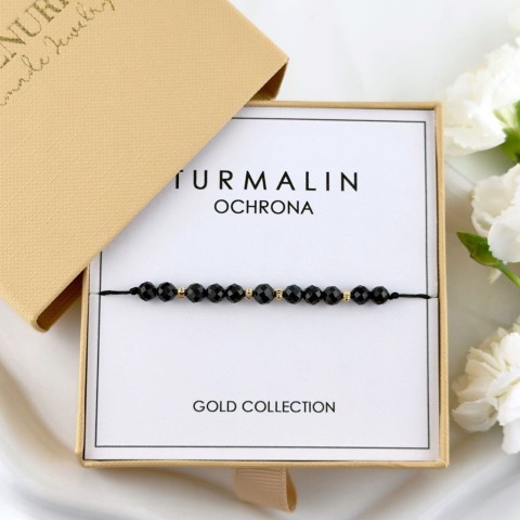 złota bransoletka z czarnego turmalinu na czarnym sznurku złoto 585