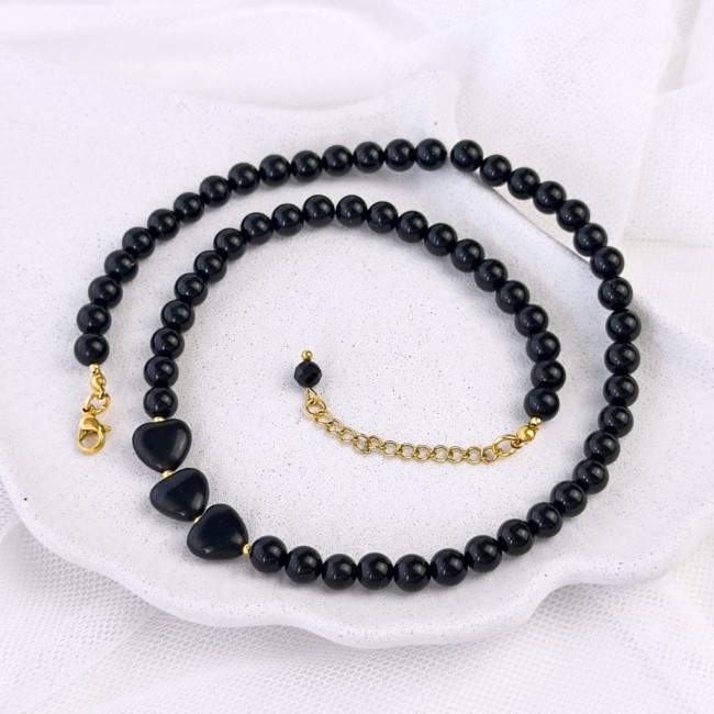 regulowany choker damski z czarnego kamienia onyksu z dużymi sercami