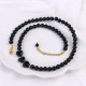 regulowany choker damski z czarnego kamienia onyksu z dużymi sercami