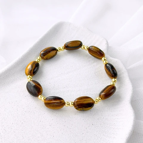brązowa bransoletka z dużych kamieni tygrysiego oka na gumce