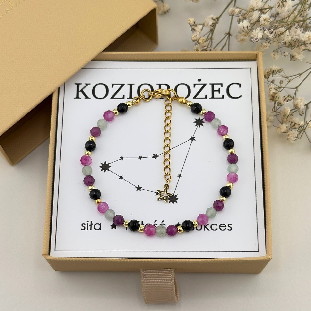 bransoletka zodiakalna dla koziorożca z kamieni naturalnych zapinana na karabińczyk z zawieszką gwiazdy